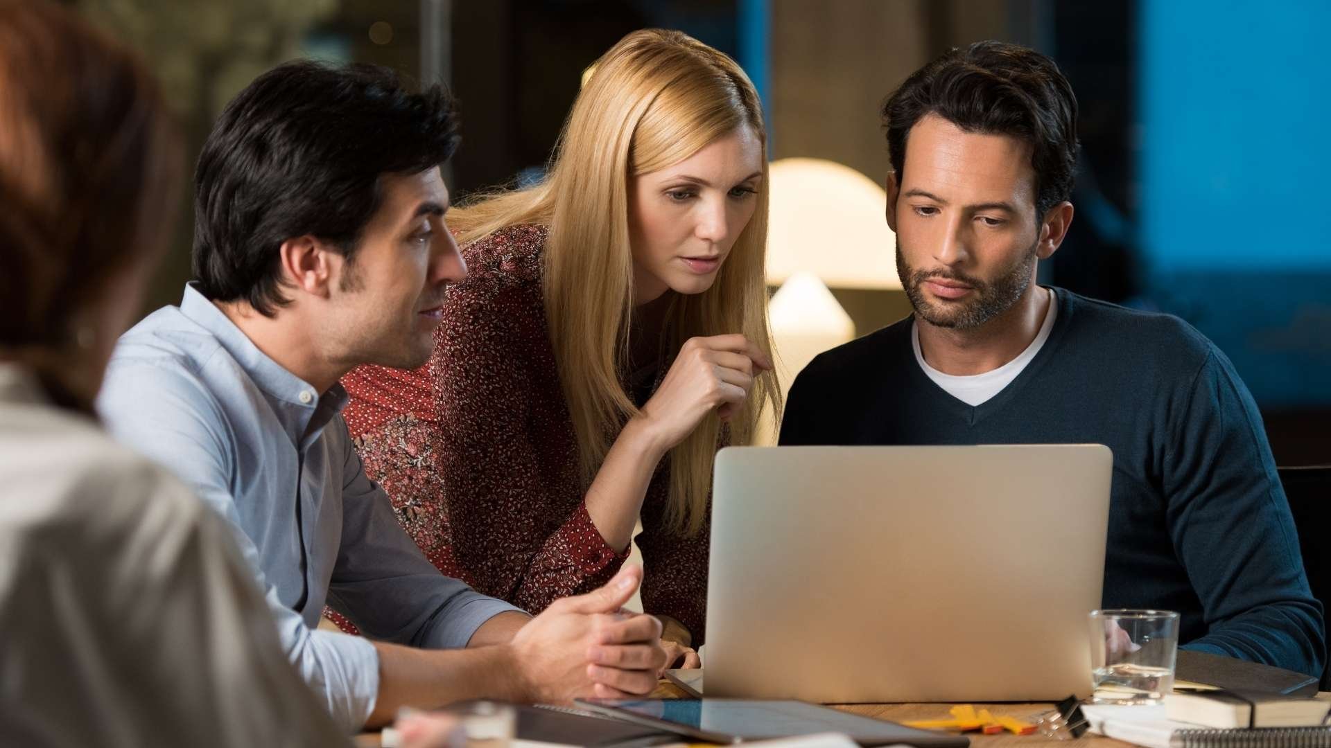 Hiring manager reviewing candidate skills assessment data before making a hiring decision